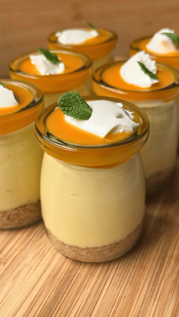 final shot of no bake mini mango cheesecakes