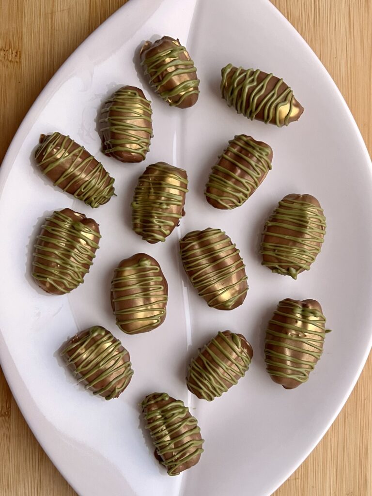 Viral Dubai Chocolate Dates made with dates, pistachio paste, and the crunch of kataifi pastry wrapped in milk chocolate 